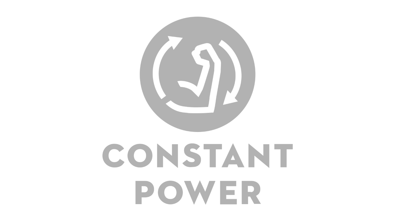 Ikona s ohnutou paží a dvěma šipkami ve směru hodinových ručiček, pod nimi stojí nápis „Constant Power“